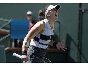 Canadian Bianca Andreescu celebrates after winning a point against Angelique Kerber of Germany during the women's final at the BNP Paribas Open tennis tournament on Sunday, March 17, 2019, in Indian Wells, Calif.