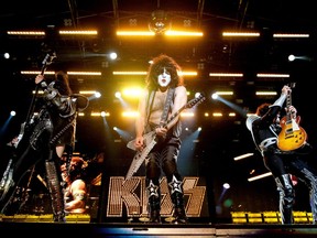 Gene Simmons, left, Paul Stanley and Tommy Thayer brought their megawatt production to the Heavy MTL festival at Montreal's Parc Jean-Drapeau in 2011. Co-founders Simmons and Stanley's devotion to their own corporation has been a constant for 46 years.