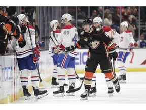 Anaheim Ducks' Daniel Sprong celebrates his goal as he skates past Canadiens players on Friday, March 8, 2019, in Anaheim, Calif.