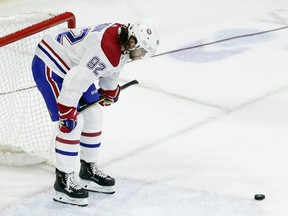 Montreal Canadiens' Jonathan Drouin pauses following a 2-1 loss in overtime against the Carolina Hurricanes in Raleigh, N.C., on Sunday, March 24, 2019.