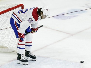 Montreal Canadiens' Jonathan Drouin (92) pauses following a 2-1 loss in overtime against the Carolina Hurricanes in an NHL hockey game in Raleigh, N.C., Sunday, March 24, 2019.