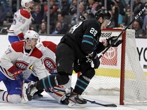 San Jose Sharks' Timo Meier, right, celebrates after scoring a goal past Montreal Canadiens' Brett Kulak (17) during the third period of an NHL hockey game Thursday, March 7, 2019, in San Jose, Calif.