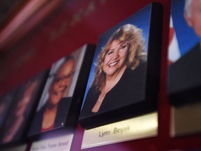 A picture of Senator Lynn Beyak accompanies other Senators official portraits on a display outside the Senate on Parliament Hill in Ottawa on Thursday, Sept. 21, 2017. The Senate's ethics officer says Sen. Lynn Beyak violated the upper chamber's conflict of interest code by posting racist letters about Indigenous Canadians on her website.