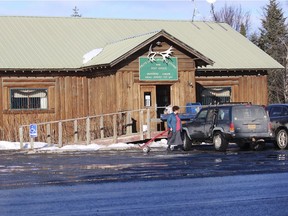 In this Feb. 26, 2019 photo is the Fritz Creek General Store, shown near Homer, Alaska. A cat named Stormy that has spent more than six years as a fixture in a remote Alaska general store is being forced out after officials notified the store owners that the cat's presence violates food safety standards. The Homer News reported Thursday, Feb. 28, 2019, that the Fritz Creek General Store near the small city of Homer has been home for Stormy since 2012. (Megan Pacer/Homer News via AP) ORG XMIT: AKHOM501