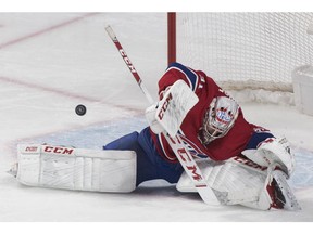 Canadiens goaltender Carey Price stops a Chicago Blackhawks shot in Montreal on Saturday, March 16, 2019.