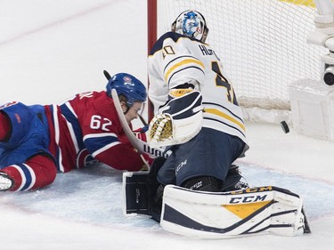 Montreal Canadiens' Artturi Lehkonen (62) scores against Buffalo Sabres goaltender Carter Hutton during second period NHL hockey action in Montreal, Saturday, March 23, 2019.