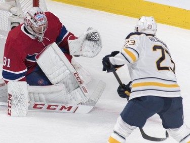 Buffalo Sabres' Sam Reinhart moves in on Montreal Canadiens goaltender Carey Price during first period NHL hockey action in Montreal, Saturday, March 23, 2019.