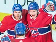 Montreal Canadiens' Artturi Lehkonen (62) celebrates with teammates Andrw Shaw (65) and Max Domi (13) after scoring during second period NHL hockey action against the Buffalo Sabres, in Montreal, Saturday, March 23, 2019.