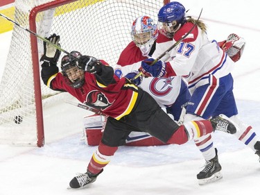 Calgary Inferno's Brianna Decker (left) celebrates after teammate Zoe Hickel scored her team's opening goal on Les Canadiennes de Montreal's goaltender Emerance Maschmeyer during first period action in the 2019 Clarkson Cup game in Toronto, on Sunday, March 24, 2019.