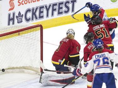 Les Canadiennes de Montreal's Ann-Sophie Bettez (top right) scores her team's second goal on Calgary Inferno's goaltender Alex Rigsby during second period action in the 2019 Clarkson Cup game in Toronto, on Sunday, March 24, 2019.