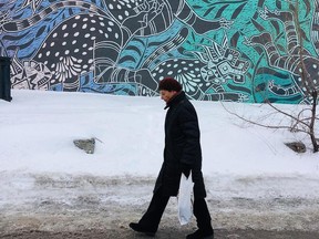 Submit your photos of Montreal via Instagram by tagging them with #ThisMtl for the chance to appear in our morning file. Today’s photo of a sombre stroll past some excellent street art was posted on Instagram by @lapetiteardoise.