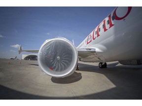 An Ethiopian Airlines Boeing 737 Max 8 sits grounded at Bole International Airport in Addis Ababa, Ethiopia Saturday, March 23, 2019. The chief of Ethiopian Airlines says the warning and training requirements set for the now-grounded 737 Max aircraft may not have been enough following the Ethiopian Airlines plane crash that killed 157 people.