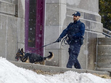 Montreal police officers at the scene of a stabbing at St. Joseph's Oratory March 22, 2019. Father Claude Grou is in stable condition.