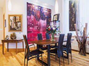 Three large paintings by the Armenian artist Garen Bedrossian dominate the decor in the dining room.