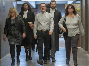 Michel Cadotte, accused of murder in the 2017 death of his ailing wife in what has been described as a mercy killing, arrives for his sentencing hearing at the courthouse Friday, March 8, 2019 in Montreal.