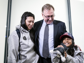 Vanessa Rodel and her seven-year-old daughter Keana with lawyer Robert Tibbo after arriving in Toronto on March 25, 2019.