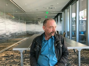 Timothy Ray Brown poses for a photograph, Monday, March 4, 2019, in Seattle. Brown, also known as the "Berlin patient," was the first person to be cured of HIV infection, more than a decade ago. Now researchers are reporting a second patient has lived 18 months after stopping HIV treatment without sign of the virus following a stem-cell transplant. But such transplants are dangerous, cannot be used widely and have failed in other patients.