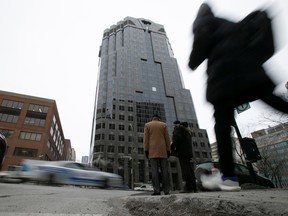 SNC-Lavalin's headquarters in Montreal. On Thursday, the engineering company announced an official restructuring of its business, and made three leadership changes.