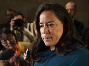 Jody Wilson-Raybould talks to reporters after testifying before the federal justice committee in Ottawa on Wednesday, Feb. 27, 2019.