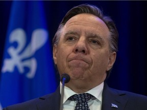 Quebec Premier Francois Legault speaks with the media in January 2019.