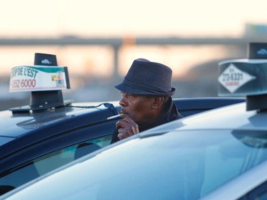 Taxi drivers gather at Galeries d'Anjou ahead of a planned strike on Monday March 25, 2019