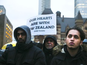 Hundred gathered at Toronto's Nathan Phillips Square for a vigil to honour of the victims of the New Zealand mosque shooting on Friday March 15, 2019.