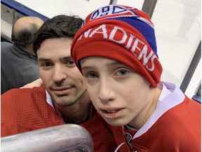 Anderson Whitehead, age 11, meets his idol, Canadiens goaltender Carey Price, following the team's morning skate on Feb. 23, 2019, in Toronto. Whitehead's mother, Laura McKay, died in November 2018 at age 44 from cancer and her dying wish was to fulfill her son's dream to meet Price.