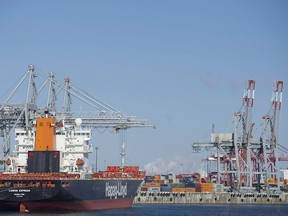 Container ships are shown in the Port of Montreal on January 4, 2016.