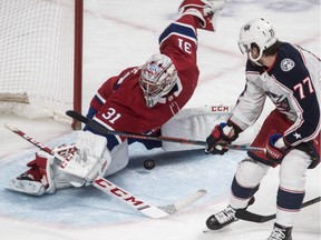 Montreal Canadiens' Carey Price stops Columbus Blue Jackets winger Josh Anderson alone in front of the net during second period at the Bell Centre in Montreal on Feb. 19, 2019.