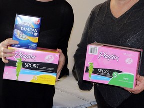 United Way Oxford are hosting Tampon Tuesday with the goal of collecting feminine hygiene products to donate them to local agencies through Oxford County. ItÕll take place at KelseyÕs on Norwich Avenue from 5 to 7 p.m.  From left: Brittany Taylor and Kelly Gilson  Greg Colgan/Woodstock Sentinel-Review/Postmedia Network