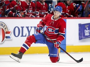 Montreal Canadiens' Jesperi Kotkaniemi gets to his feet after being checked during second period against the New York Islanders in Montreal on March 21, 2019.