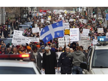 Thousands of people marched on René Lévesque Blvd. in Montreal on Sunday, April 7, 2019, to denounce the Quebec government's Bill 21. The Canadian Collective Anti- Islamophobia (CCAI) called for people to come out to protest against the CAQ government's secularism bill, which they say is "discriminatory and undermines the fundamental rights of religious minorities in Quebec, particularly Muslim women wearing the hijab."