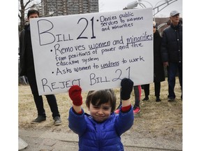 Edmond Emad holds a sign at a Rally For Religious Freedom and against the CAQ government's Bill 21 in Côte-St-Luc on Saturday, April 14, 2019.