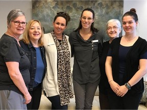 From left, Christiane Lecavalier (Préposé aux bénéficiaire), Susan Bednarski, (director of volunteer resources), Laura Lindner (psychosocial coordinator), Stéphanie Alleyn (nurse), Rachel Girard (volunteer) and Sandy Lafrance (nurse) help provide dignity to patients on the cusp of death at the palliative care residence in Hudson.