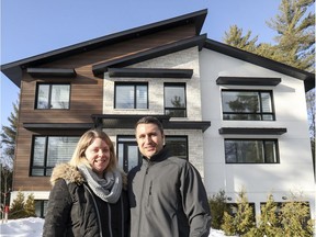 Bardhi Nick Sulollari and Audrey Besner outside their LEED-certified platinum energy efficient home in St-Lazare.