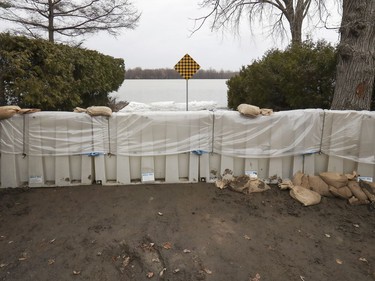 A flood barrier is in place at the foot of de Gaulle St. in the Pierrefonds-Roxboro borough Thursday April 18, 2019.
