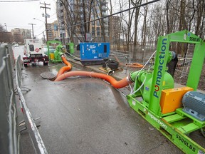 Massive pumps sit ready help keep water from flooding the underground drainage system alongside Rive-Boise in Pierrefonds.