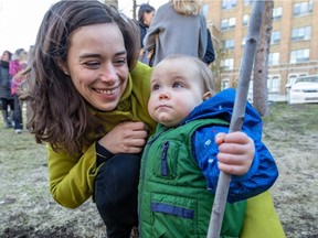 Laurence Lavigne Lalonde and her 13-month-old Alexie attended the 24th traditional tree planting of Earth Day at St. Mary's Hospital in Montreal on Monday April 22, 2019.