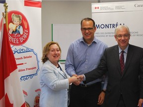 Baie-D'Urfé Mayor Maria Tutino, Marc Lanthier, president of Lanthier Bakery, and Lac-Saint-Louis MP Francis Scarpaleggia following an announcement of a $2 million grant from the federal government to help the company purchase new equipment.