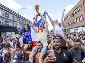 Gazette photographer John Mahoney is nominated in the Coup d’oeil category for this feature photo he took of soccer fans in the street after France defeated Croatia to win the World Cup last year.