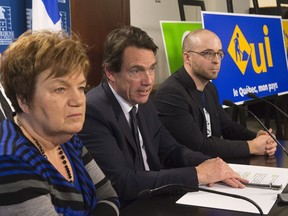 Claudette Carbonneau of Oui Quebec, then-PQ Leader Pierre-Karl Peladeau and Sol Zanetti of Option Nationale in 2015 at a news conference in Quebec City.