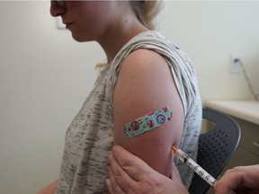 A nurse gives Michaella a measles, mumps and rubella virus vaccine made by Merck at the Utah County Health Department on April 29, 2019 in Provo, Utah. These were Michaella's first ever vaccinations. She asked that only her first name be used.