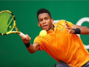 Felix Auger-Aliassime of Canada plays a forehand against Juan Ignacio Londero of Argentina in their first-round match of the Rolex Monte Carlo Masters on April 16, 2019 in Monte Carlo, Monaco.