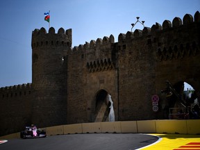 Lance Stroll steers his Racing Point during Friday practice for the Azerbaijan Grand Prix.