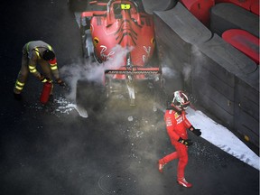 Charles Leclerc of Monaco and Ferrari looks dejected as he walks from his car after crashing during qualifying for the F1 Grand Prix of Azerbaijan at Baku City Circuit on April 27, 2019 in Baku, Azerbaijan.