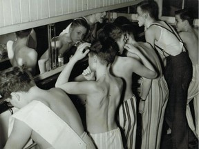 Boys at Lower Canada College, April 6, 1940. "The toothbrushing lineup is the last exercise of the day."