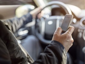 A phone can only be used for GPS purposes if it's mounted on a bracket attached to the vehicle. And it can only be used for purposes related to driving the car, which means talking, shuffling through music tracks or texting are all considered illegal activities in Quebec.