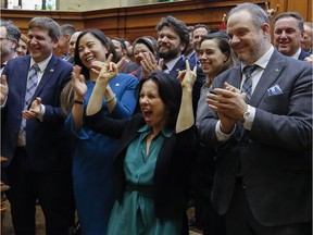 Montreal Mayor Valérie Plante flashes the 'sign of the horns' as Montreal was hailed as a "city of excellence" in heavy metal music. This was at the last city council meeting at city hall in Montreal Monday, April 15, 2019.