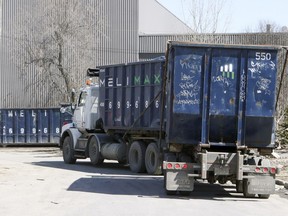 A truck delivers waste containers from Mélimax to the Ecocentre in the LaSalle Borough of Montreal Thursday April 11, 2019.