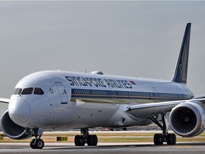 (FILES) In this file photo taken on March 28, 2018 Singapore Airlines (SIA) world's first Boeing 787-10 aircraft taxis to the terminal after its arrival from Boeing's production facility in North Charleston, South Carolina at Singapore Changi Airport. - Singapore Airlines said April 2, it had grounded two of its Boeing 787-10 Dreamliner aircraft after discovering an engine defect during inspections, the latest problem for the US planemaker.